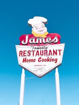 smiling restaurant manager james thompson