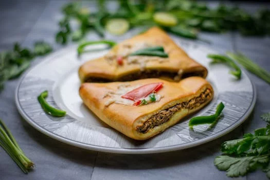 calzone golden brown stuffed cheese